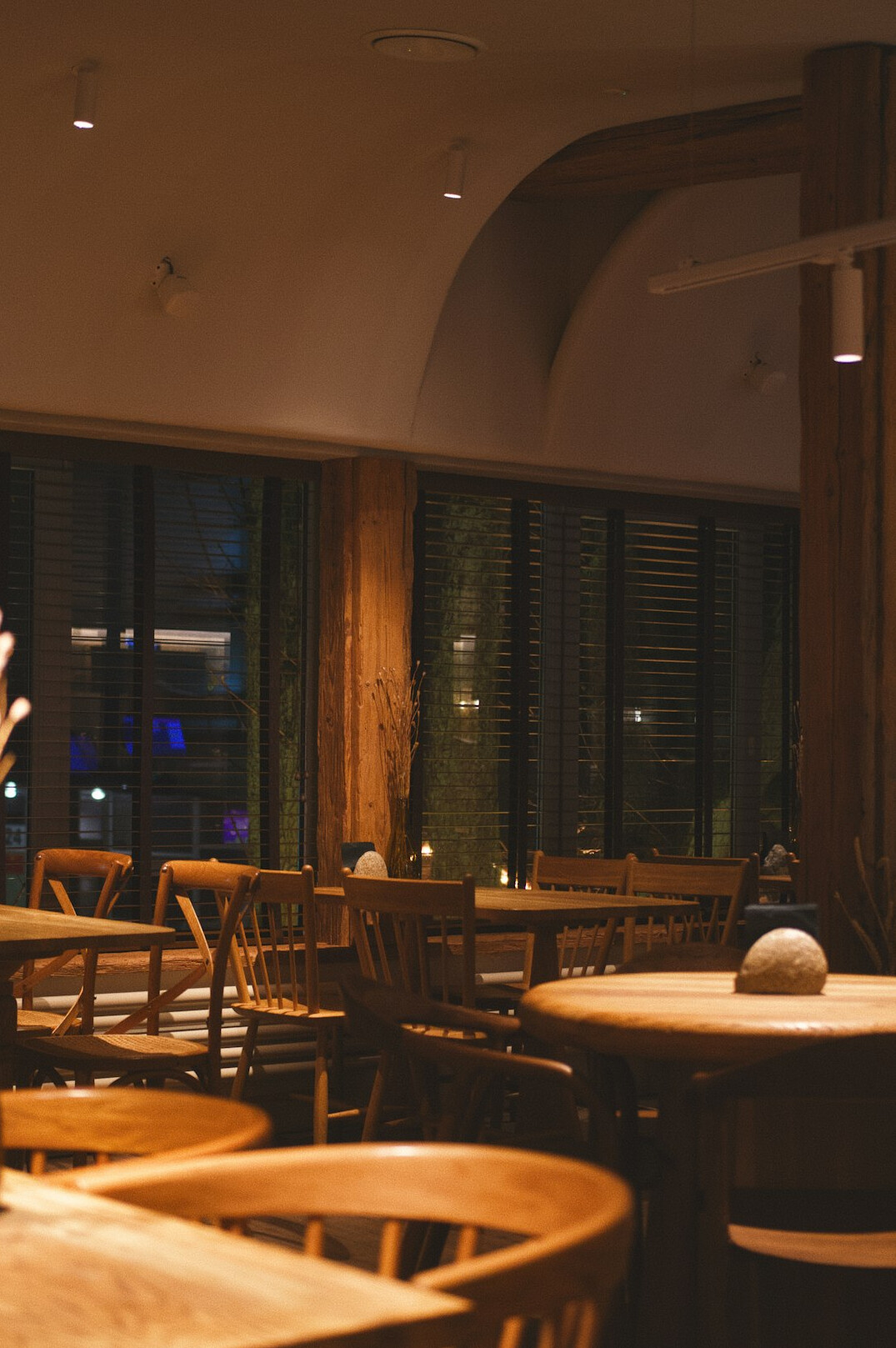 Cozy cafe interior with wooden tables used as a meeting point